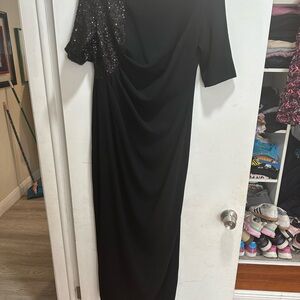 Chic Black Dress with Sequin Sleeve